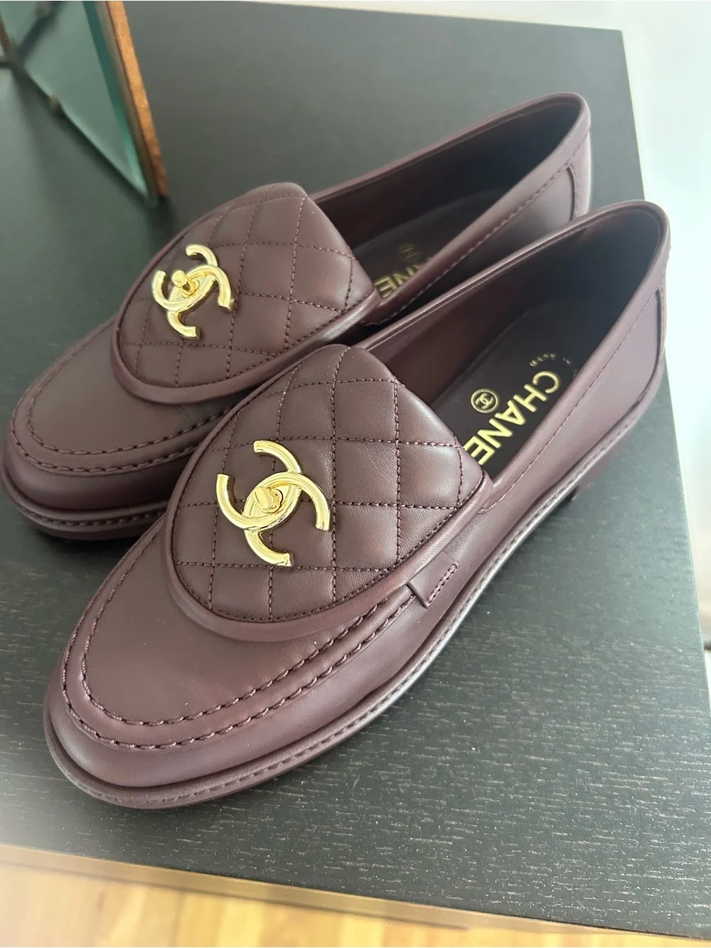 Chanel 2025 turnlock quilted loafers in burgundy 37